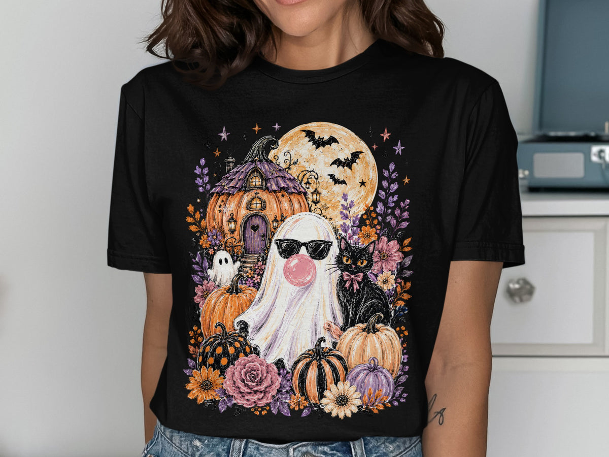 Halloween graphic on black t-shirt with ghost, black cat, pumpkins, and full moon.